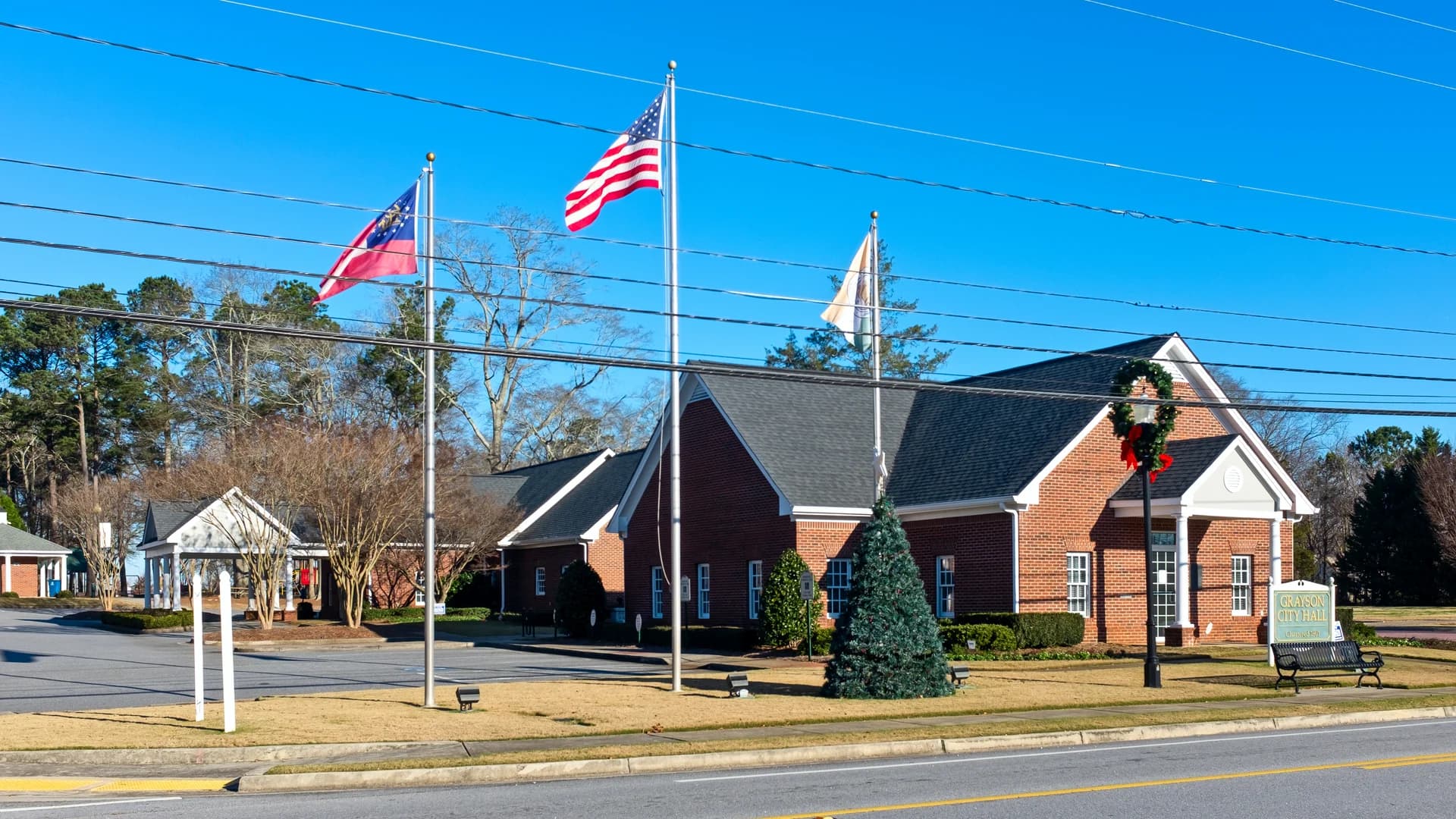 Grayson City Hall and flags in Grayson, Georgia.