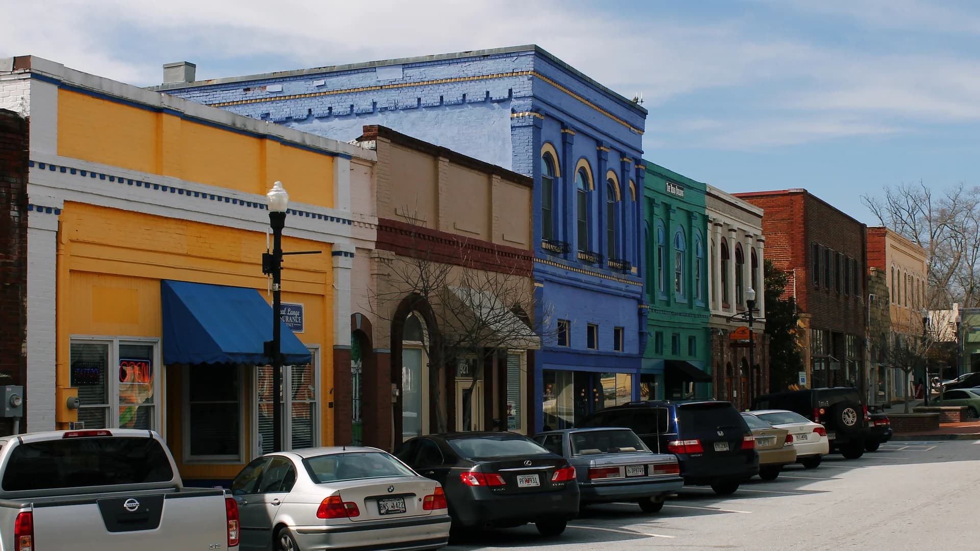 Colorful storefronts along Conyers Commercial Historic District in Georgia.