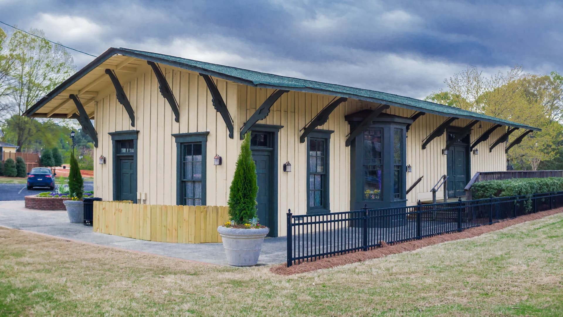 Historic Kennesaw railroad depot with its overhanging roof and bay window in downtown Kennesaw, Georgia